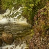 Boulder and Waterfall by Robert Albright